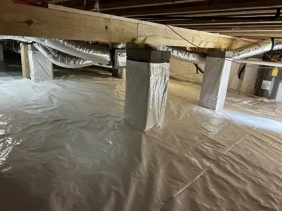 Standing water pumped out of a Four Oaks crawl space